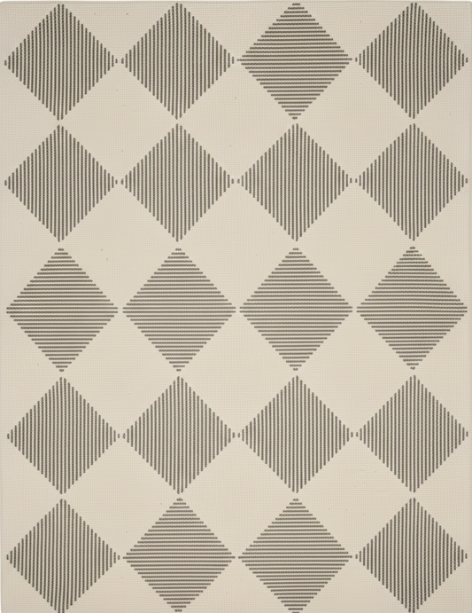 Rug with geometric diamond pattern on a plain background