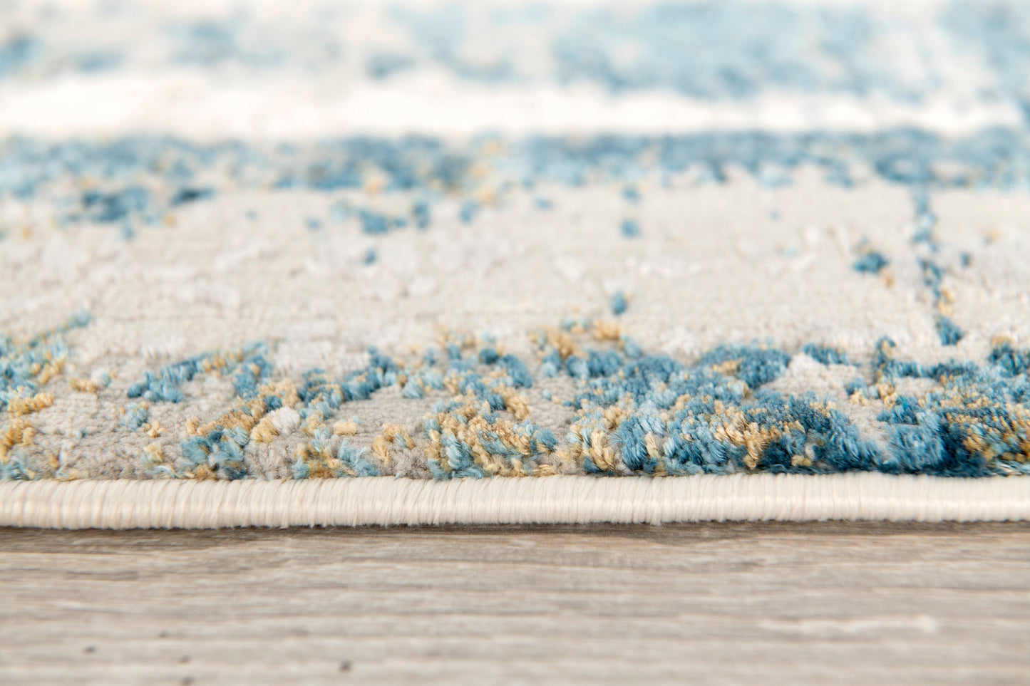 Tapis bleu contemporain abstrait Mirage